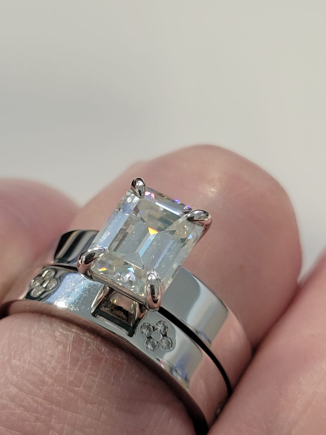 Customer photo review of Solitaire Emerald Cut Moissanite Wide Band Engagement Ring