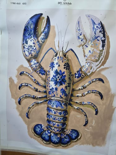 Customer's partially completed Delft Lobster paint by number kit on a white canvas