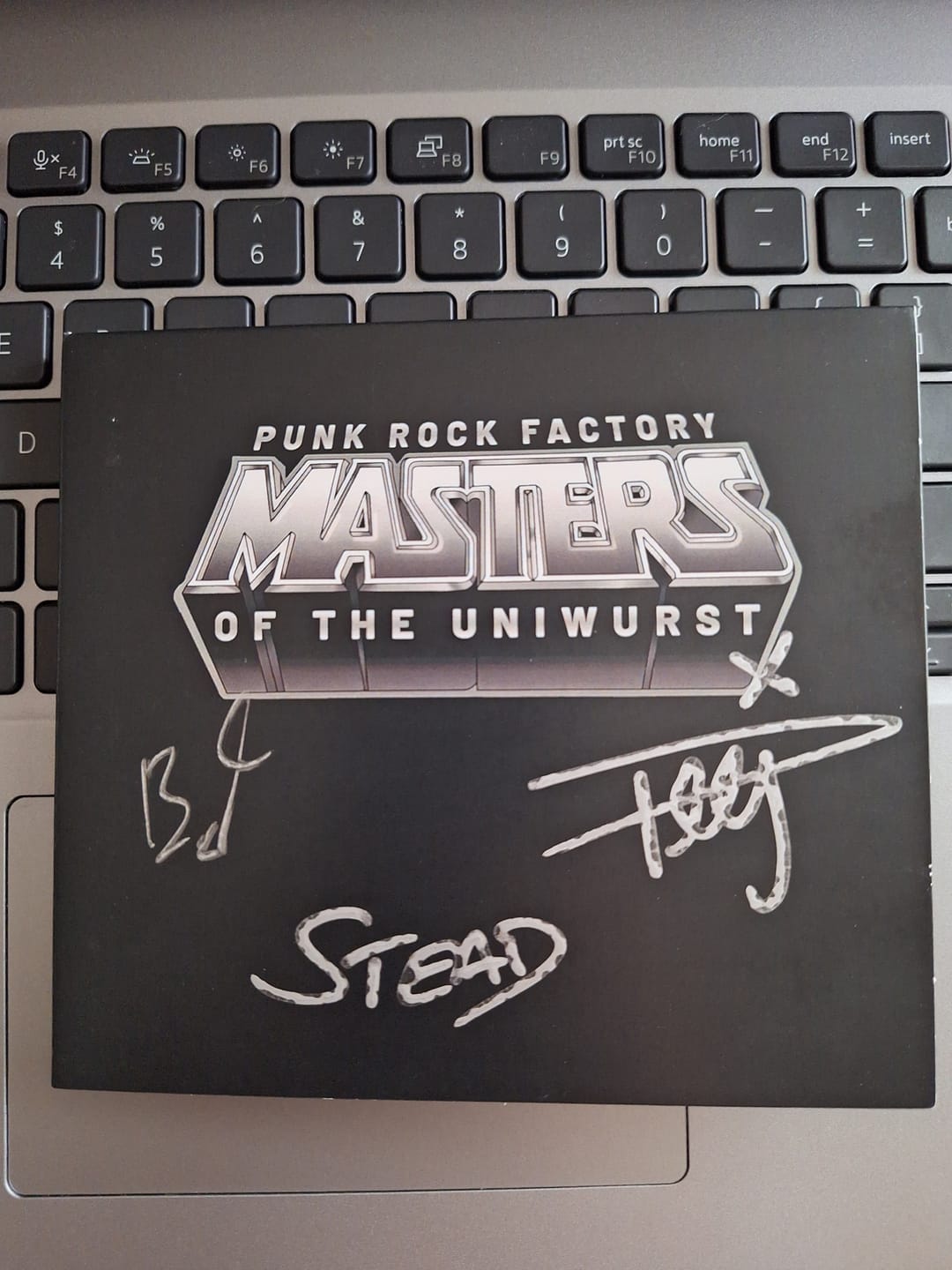 Customer photo review of Masters of the Uniwurst 2026 CD - SIGNED by the band