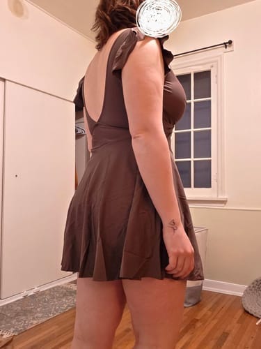 Customer photo review of Emoswim - Women's One Piece Swimsuit Ruffle Cutout Swimdress Tummy Control V Neck Wrap Swimwear