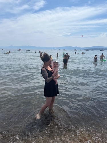 Customer photo review of Emoswim - Women's One Piece Swimsuit Ruffle Cutout Swimdress Tummy Control V Neck Wrap Swimwear