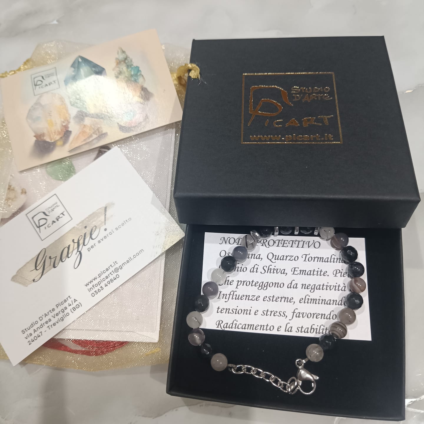 Customer photo review of Bracciale Nodo Protettivo | Occhio di Shiva, Quarzo Tormalinato, Ossidiana, Ematite - LIMITED EDITION