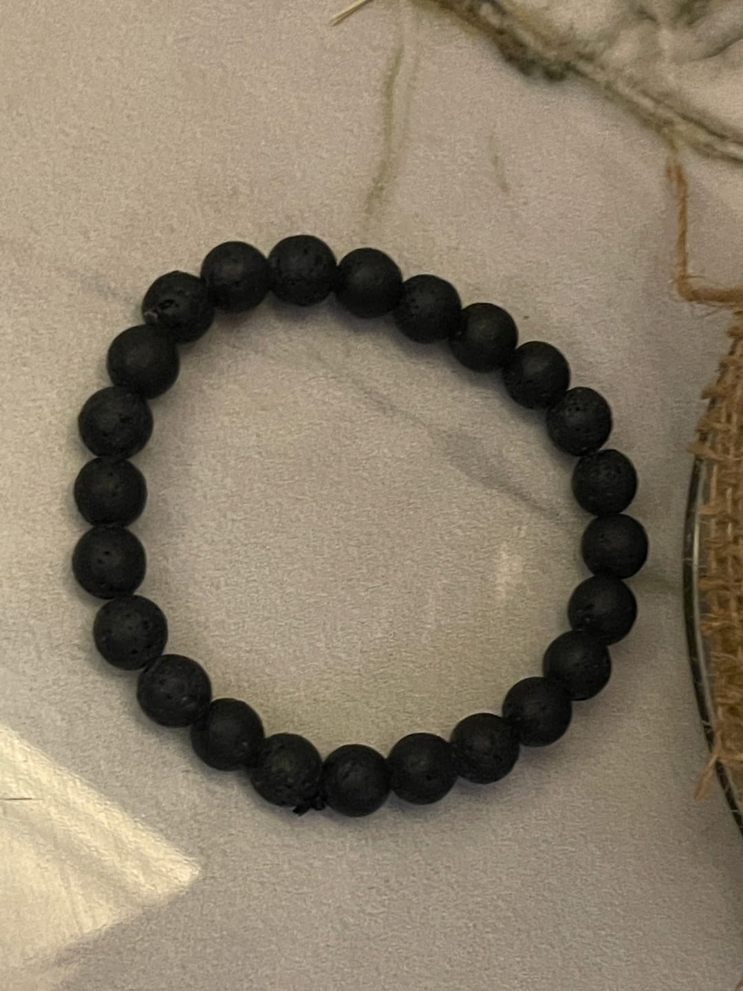Customer photo review of Natural Volcanic Lava Bracelet | Vastu Remedy for Rebirth, Energy & Emotional Balance | 8 mm Beads