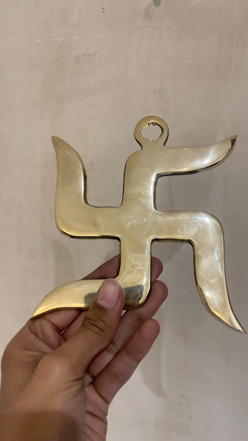 Customer photo review of Brass Swastik Wall Symbol | Vastu Remedy for Main Entrance & Auspicious Energy | 5 & 9 Inch