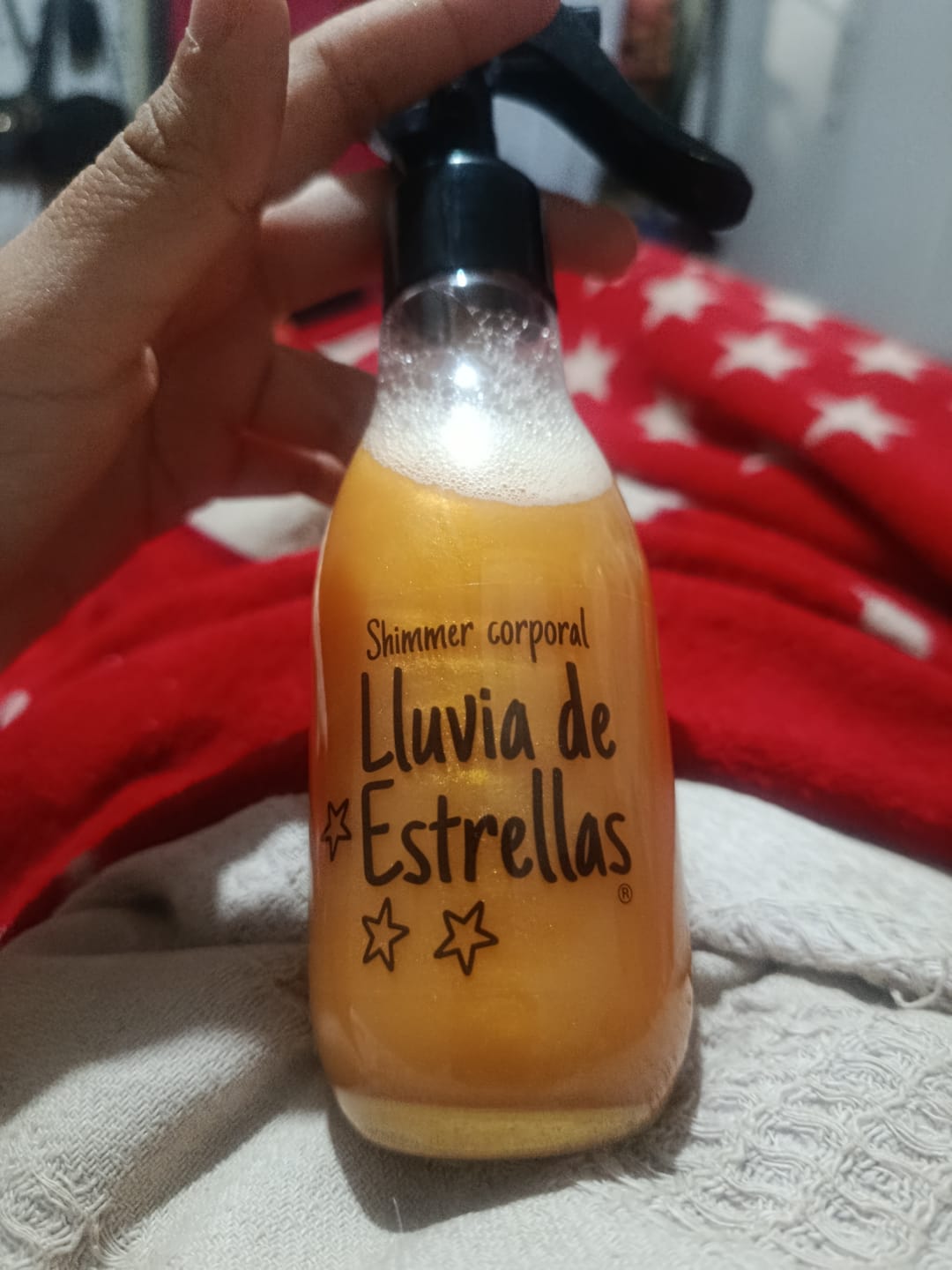 Customer photo review of LLUVIA DE ESTRELLAS TONO DORADO