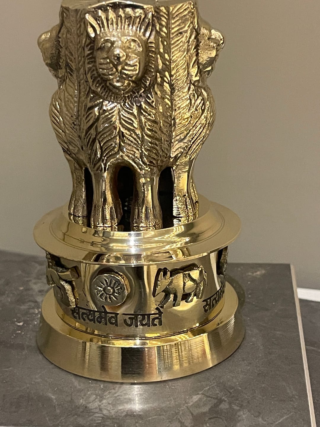 Customer photo review of Brass Ashoka Stambh Idol Vastu Remedy for Authority, Recognition and Government Support for Home, Office Desk and Institutional Spaces | 3 - 7 inch |