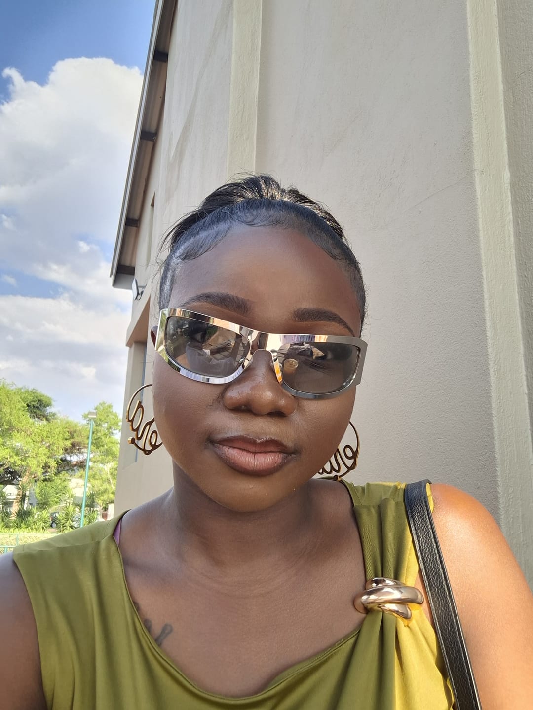 Customer photo review of Era Million Sunglasses - Silver (Worn by Zinhle on the L’tido Podcast)