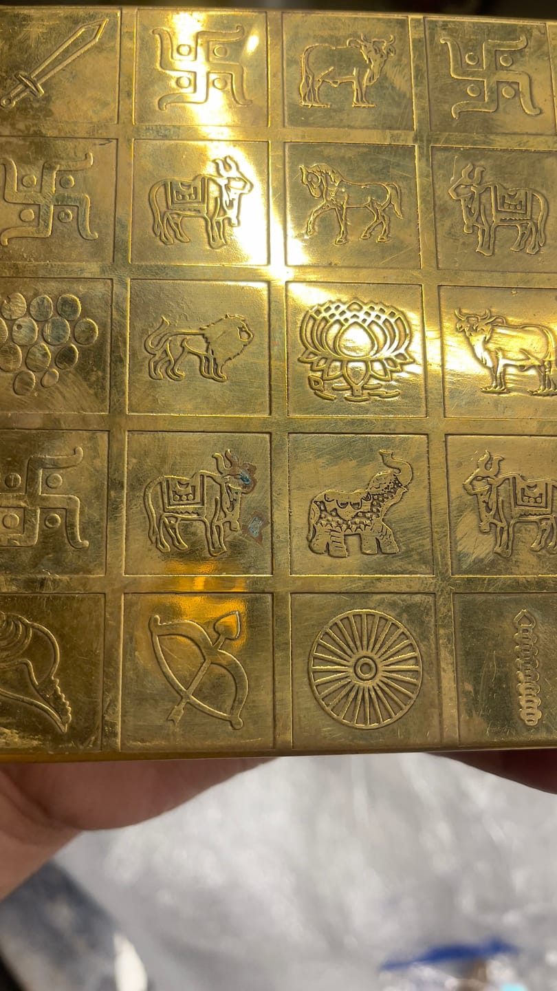 Customer photo review of Brass Manjusha Yantra Box with Partition – Vastu Remedy for Brahmasthan Correction | 16-Compartment Energy Organizer with 45 Devta Symbols | 5 & 9 Inch Sizes