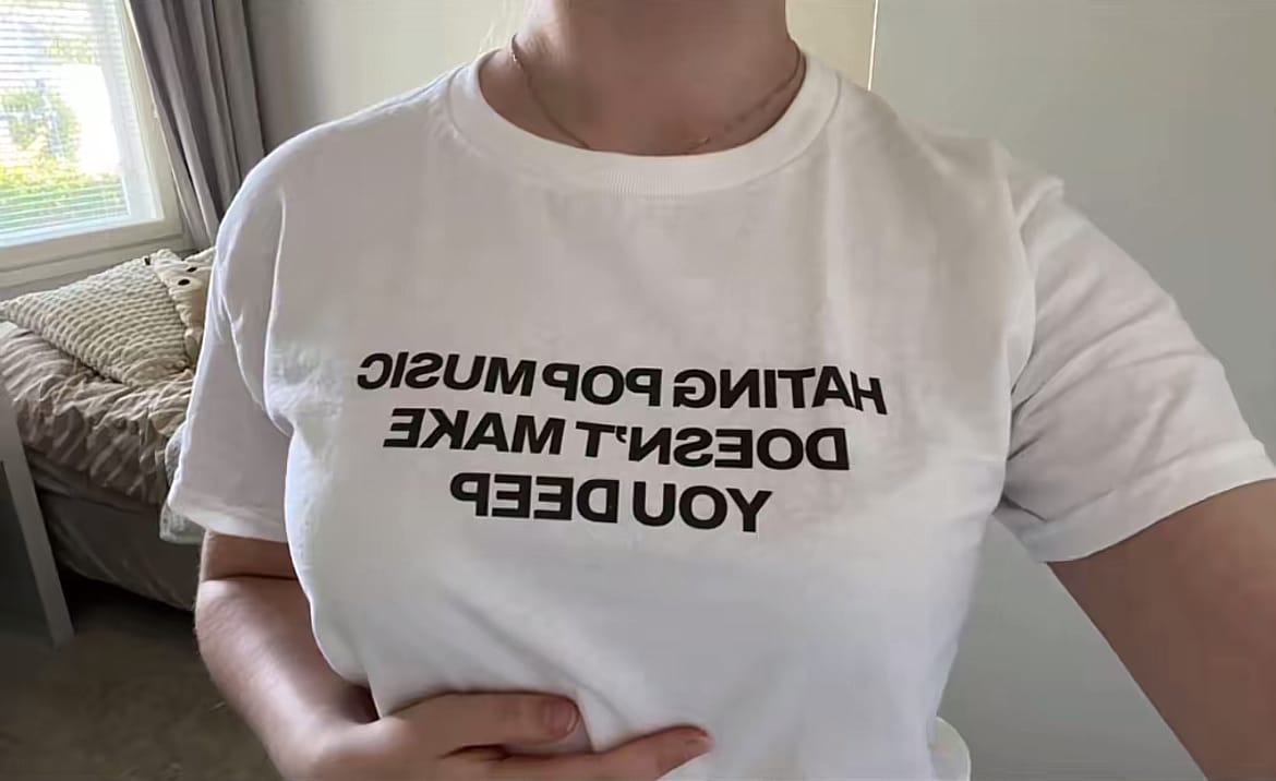 Customer photo review of Hating Pop Music Doesn't Make You Deep Baby Tee
