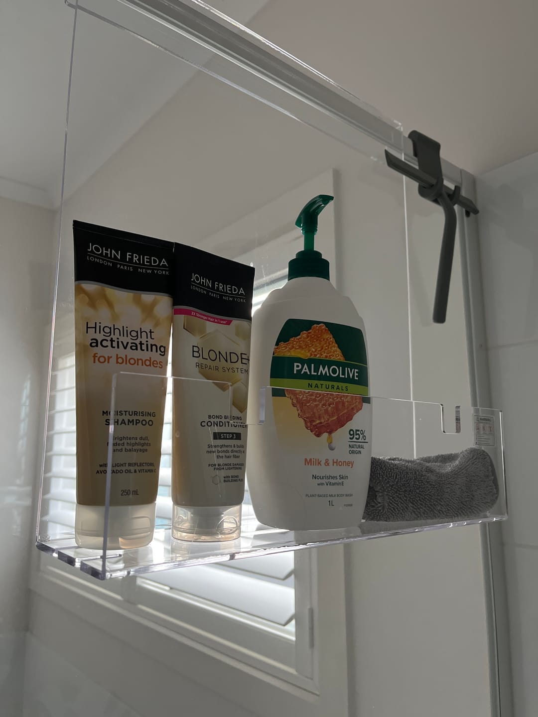 Customer photo review of Clear Acrylic Shower Shelf