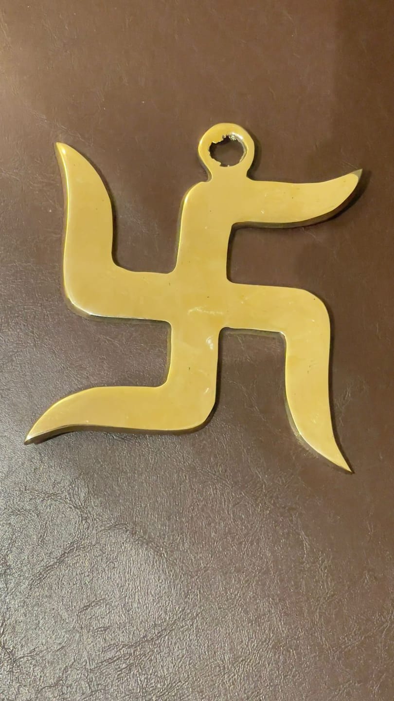 Customer photo review of Brass Swastik Wall Symbol | Vastu Remedy for Main Entrance & Auspicious Energy | 5 & 9 Inch