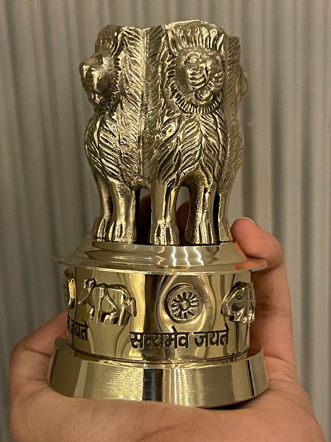 Customer photo review of Brass Ashoka Stambh Idol Vastu Remedy for Authority, Recognition and Government Support for Home, Office Desk and Institutional Spaces | 3 - 7 inch |