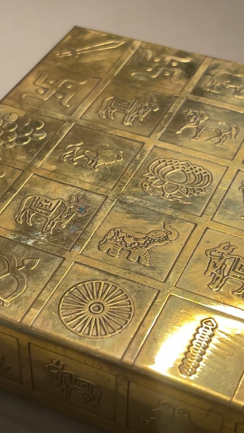 Customer photo review of Brass Manjusha Yantra Box with Partition – Vastu Remedy for Brahmasthan Correction | 16-Compartment Energy Organizer with 45 Devta Symbols | 5 & 9 Inch Sizes