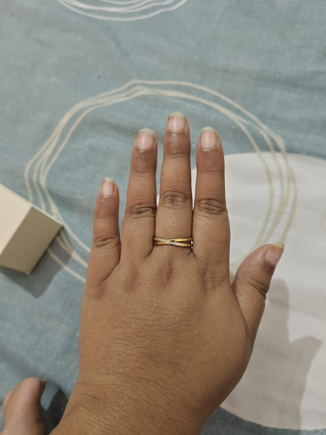 Customer photo review of Cross-Over Stones Lined Twist Ring
