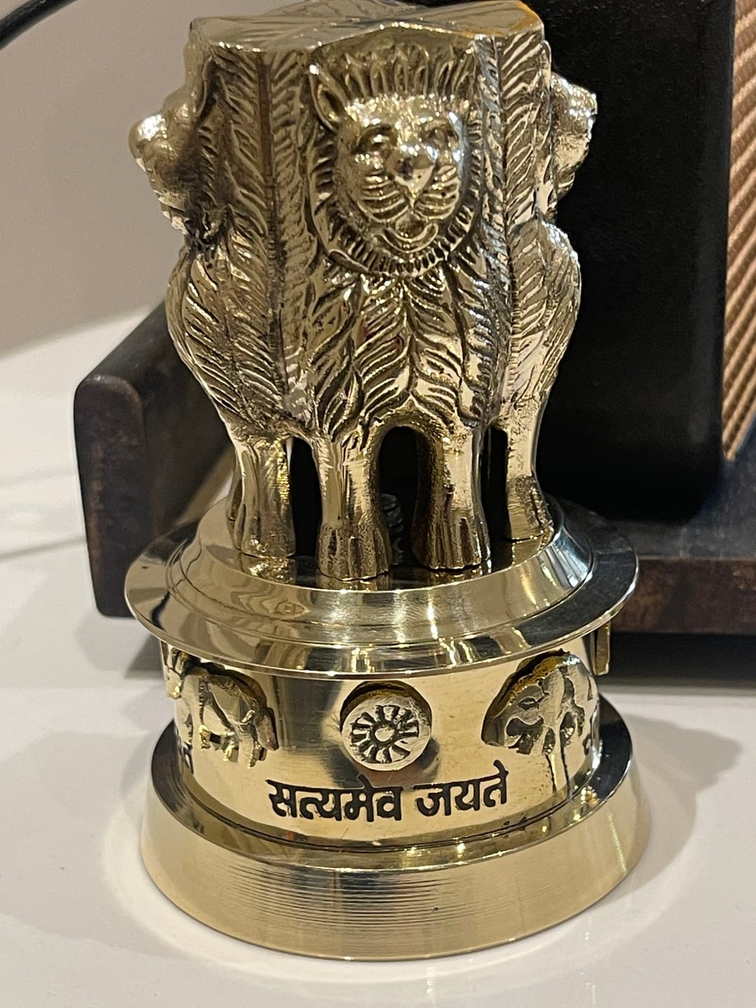 Customer photo review of Brass Ashoka Stambh Idol Vastu Remedy for Authority, Recognition and Government Support for Home, Office Desk and Institutional Spaces | 3 - 7 inch |