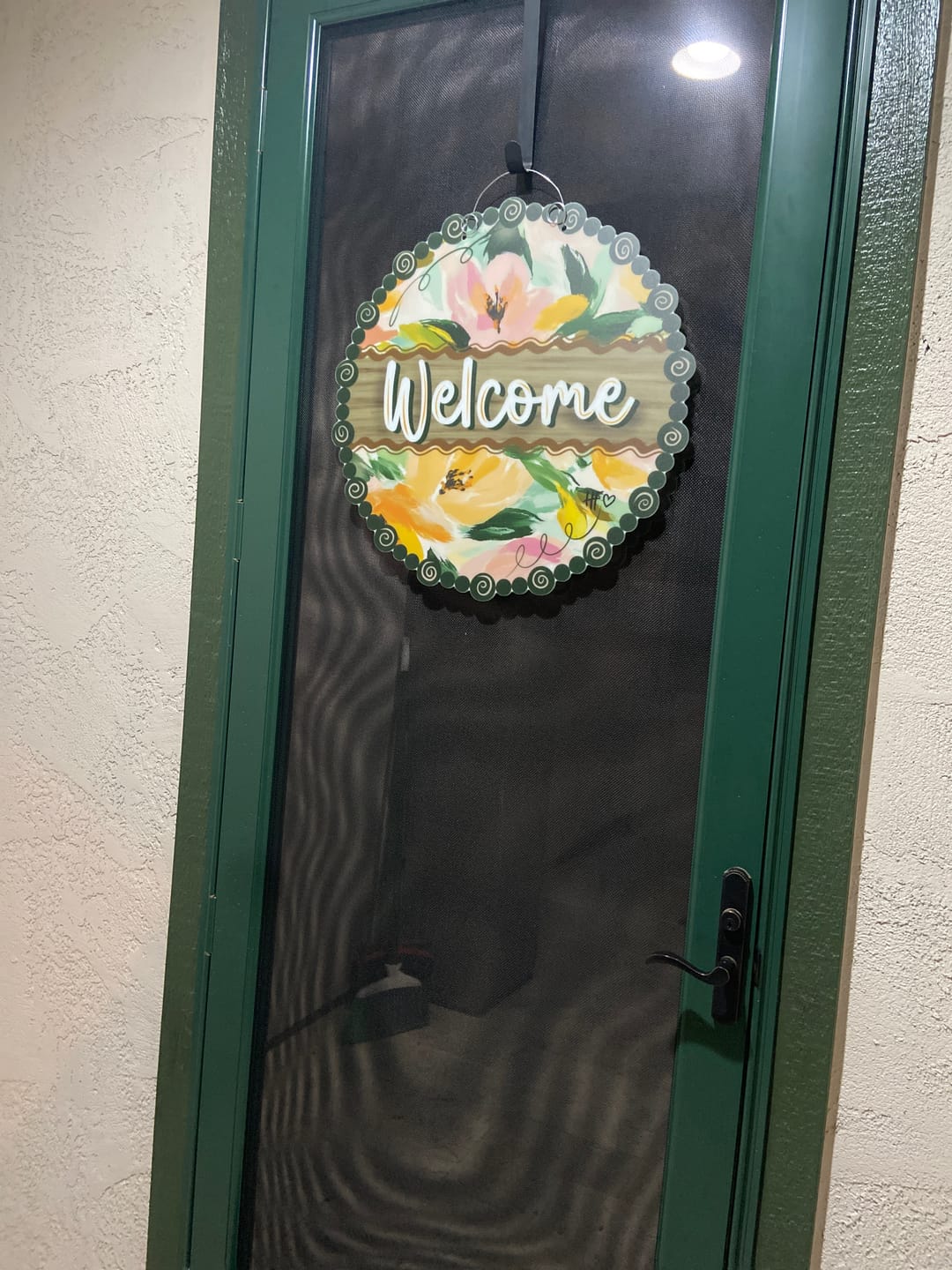 Customer photo review of Floral Paint Stroke Welcome Door Hanger