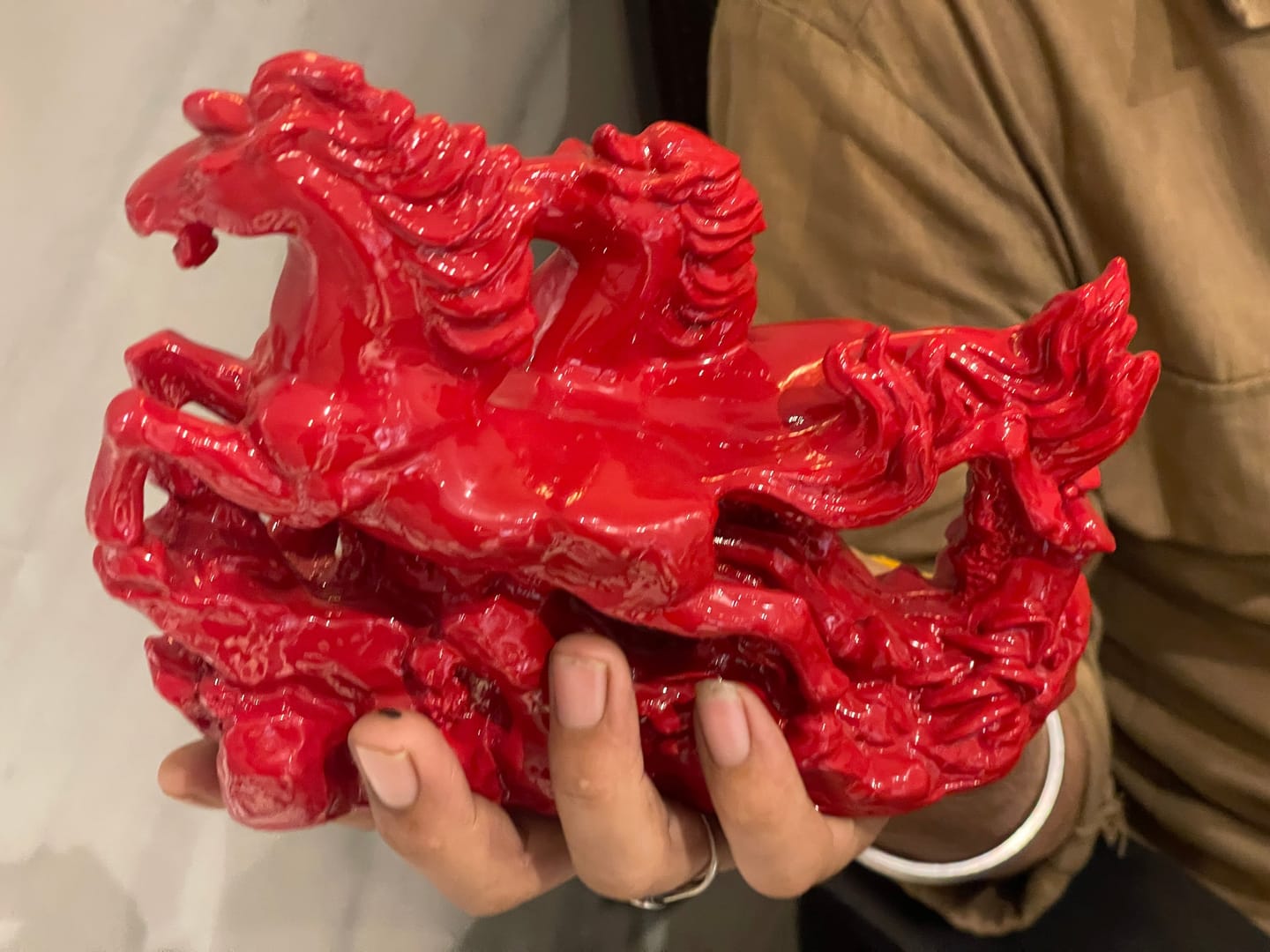 Customer photo review of Dynamic 2 Red Running Horses Resin Sculpture Vastu Remedy for Speed, Success and Career Momentum | for Office Desk, Business Spaces and Home Decor | 21 x 16 cm | 385 g