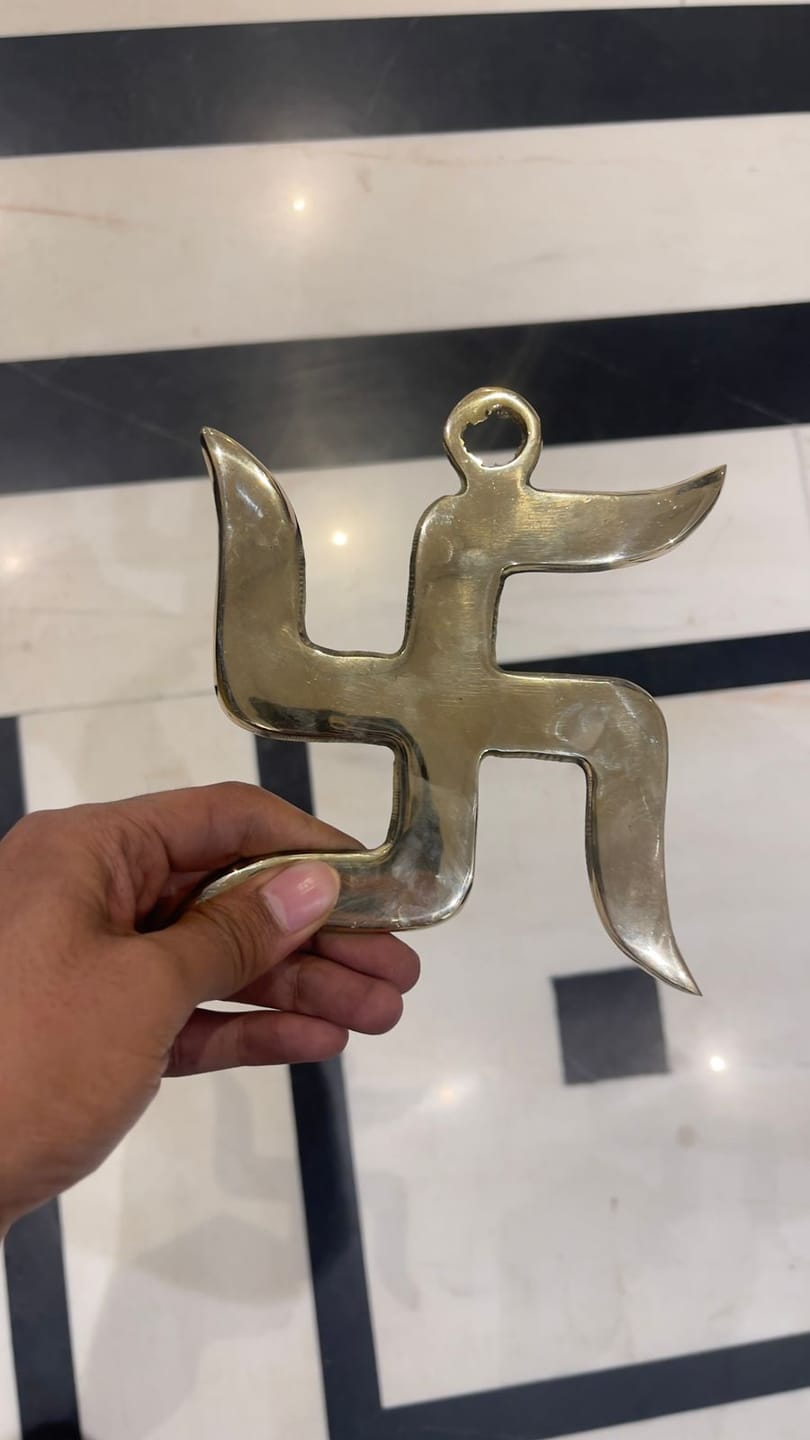 Customer photo review of Brass Swastik Wall Symbol | Vastu Remedy for Main Entrance & Auspicious Energy | 5 & 9 Inch