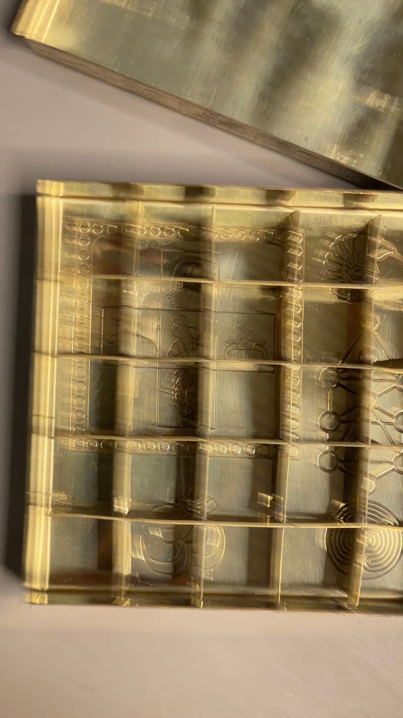 Customer photo review of Brass Manjusha Yantra Box with Partition – Vastu Remedy for Brahmasthan Correction | 16-Compartment Energy Organizer with 45 Devta Symbols | 5 & 9 Inch Sizes