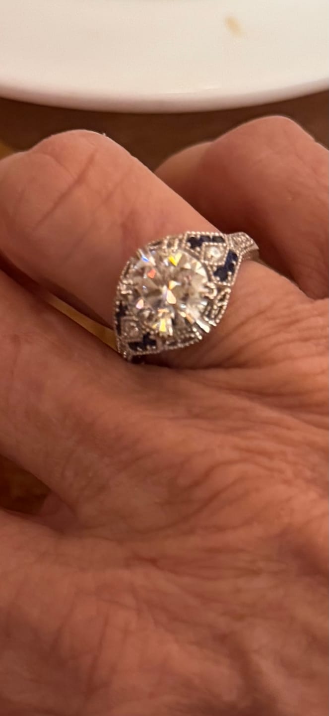 Customer photo review of Art Deco Gallery Vintage Moissanite Milgrain & Blue Accent Engagement Ring