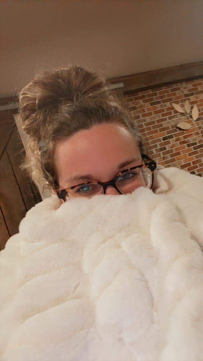 Customer photo review of Hugs Cream Blanket