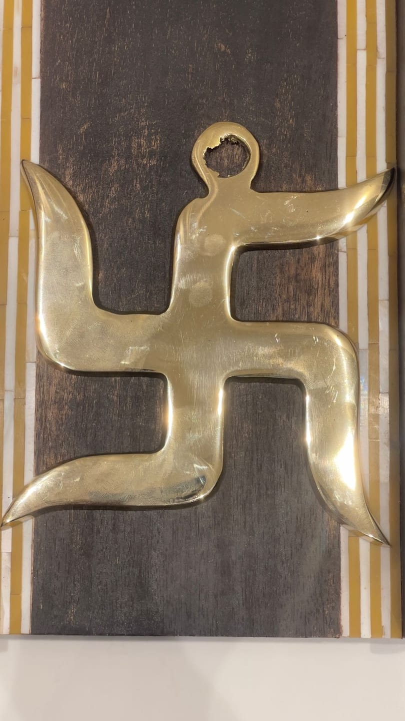 Customer photo review of Brass Swastik Wall Symbol | Vastu Remedy for Main Entrance & Auspicious Energy | 5 & 9 Inch