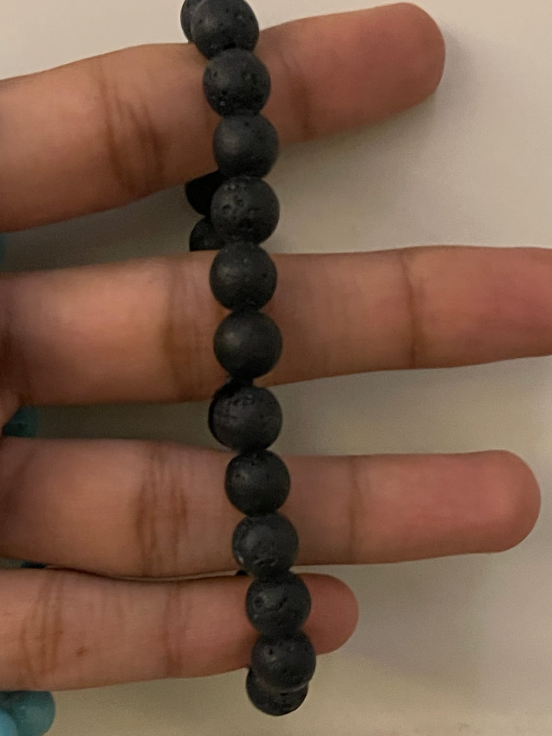 Customer photo review of Natural Volcanic Lava Bracelet | Vastu Remedy for Rebirth, Energy & Emotional Balance | 8 mm Beads