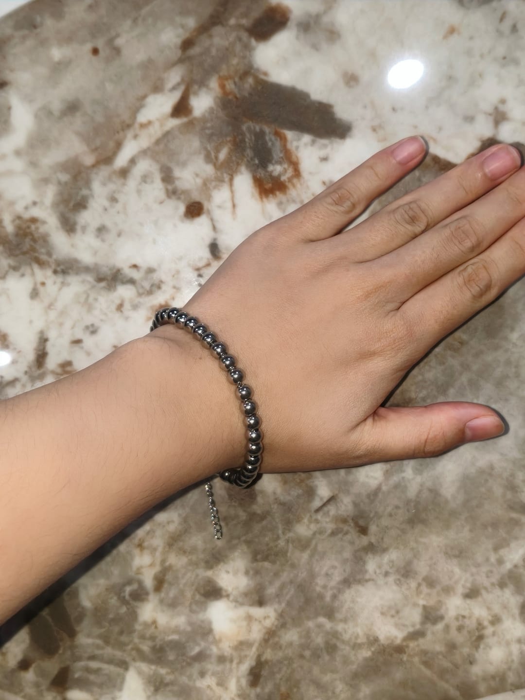 Customer photo review of HilalHaven Elegant Polished 33 Beads Tasbih Bracelet — Timeless Stainless Steel Band