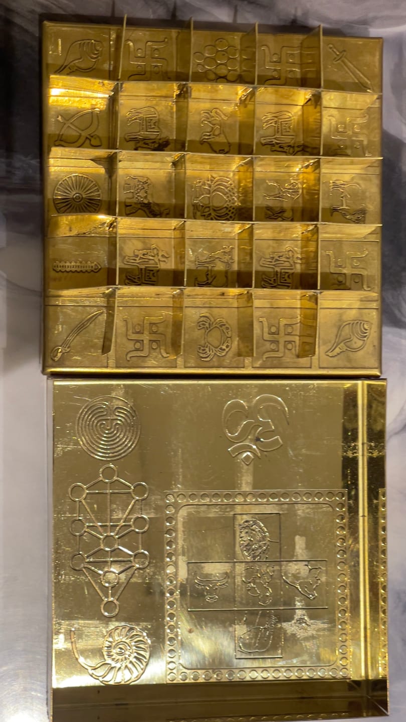 Customer photo review of Brass Manjusha Yantra Box with Partition – Vastu Remedy for Brahmasthan Correction | 16-Compartment Energy Organizer with 45 Devta Symbols | 5 & 9 Inch Sizes