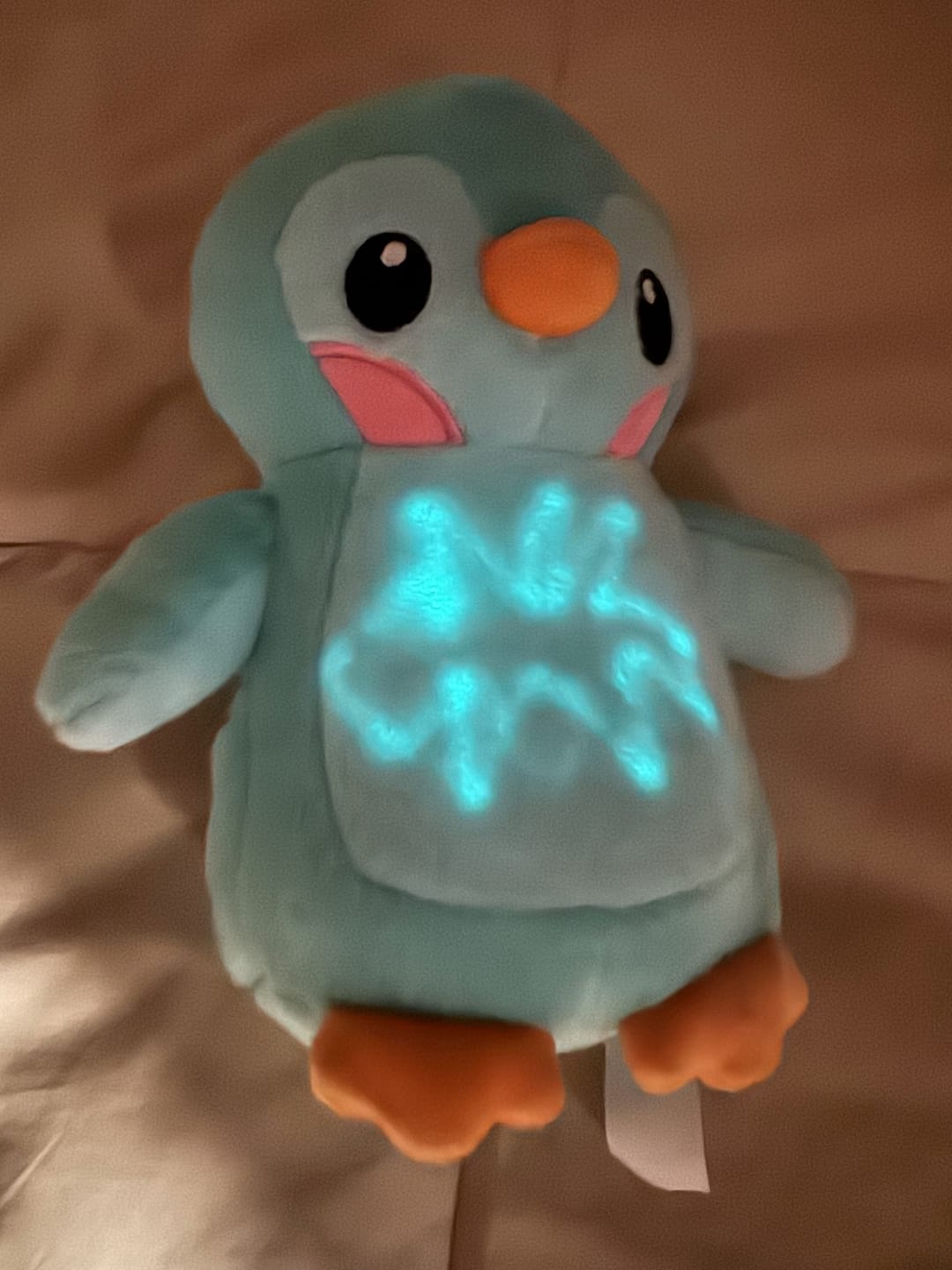 Customer photo review of Peluche Pinta en la oscuridad
