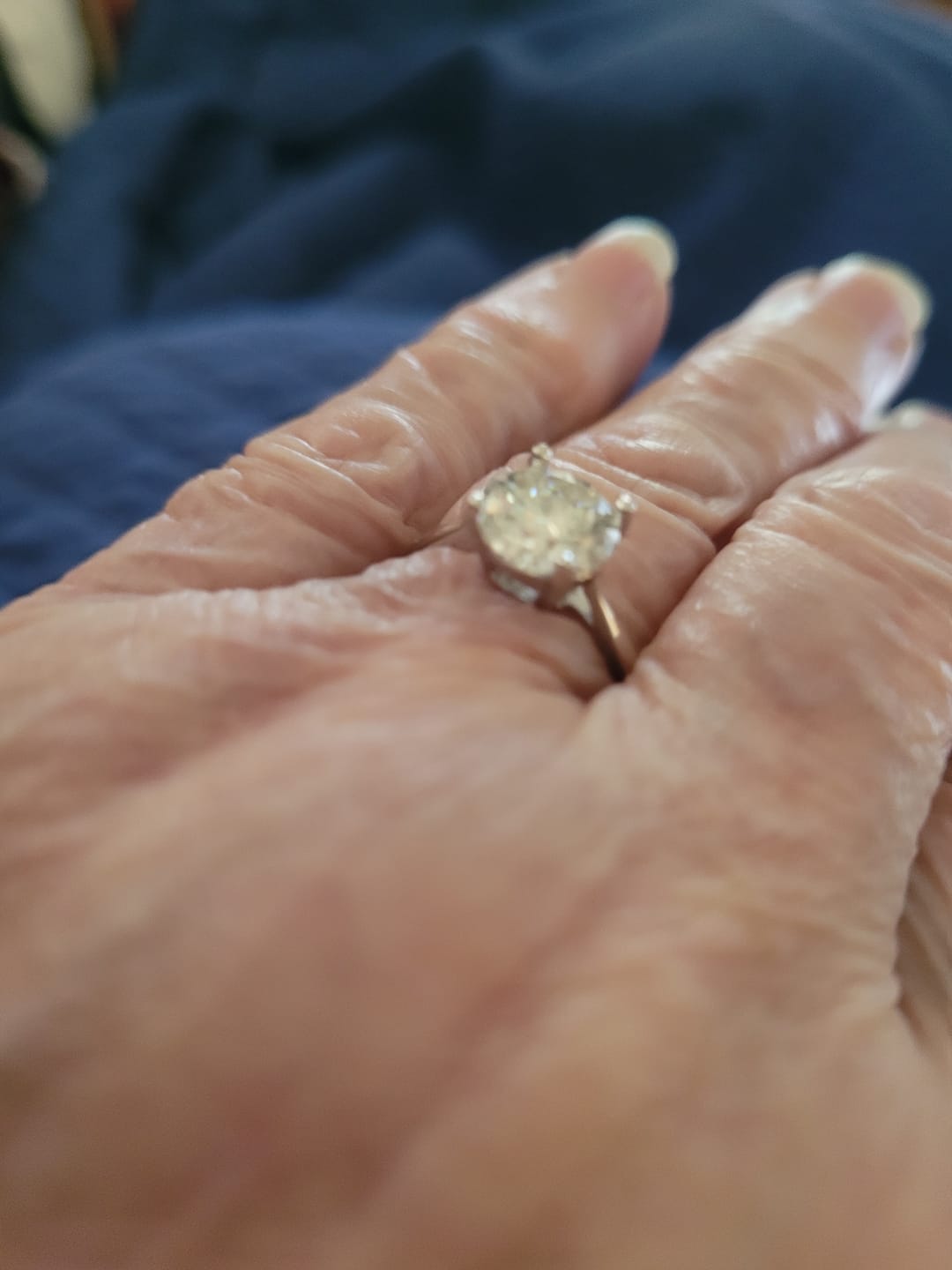 Customer photo review of Round Moissanite Stud Earrings