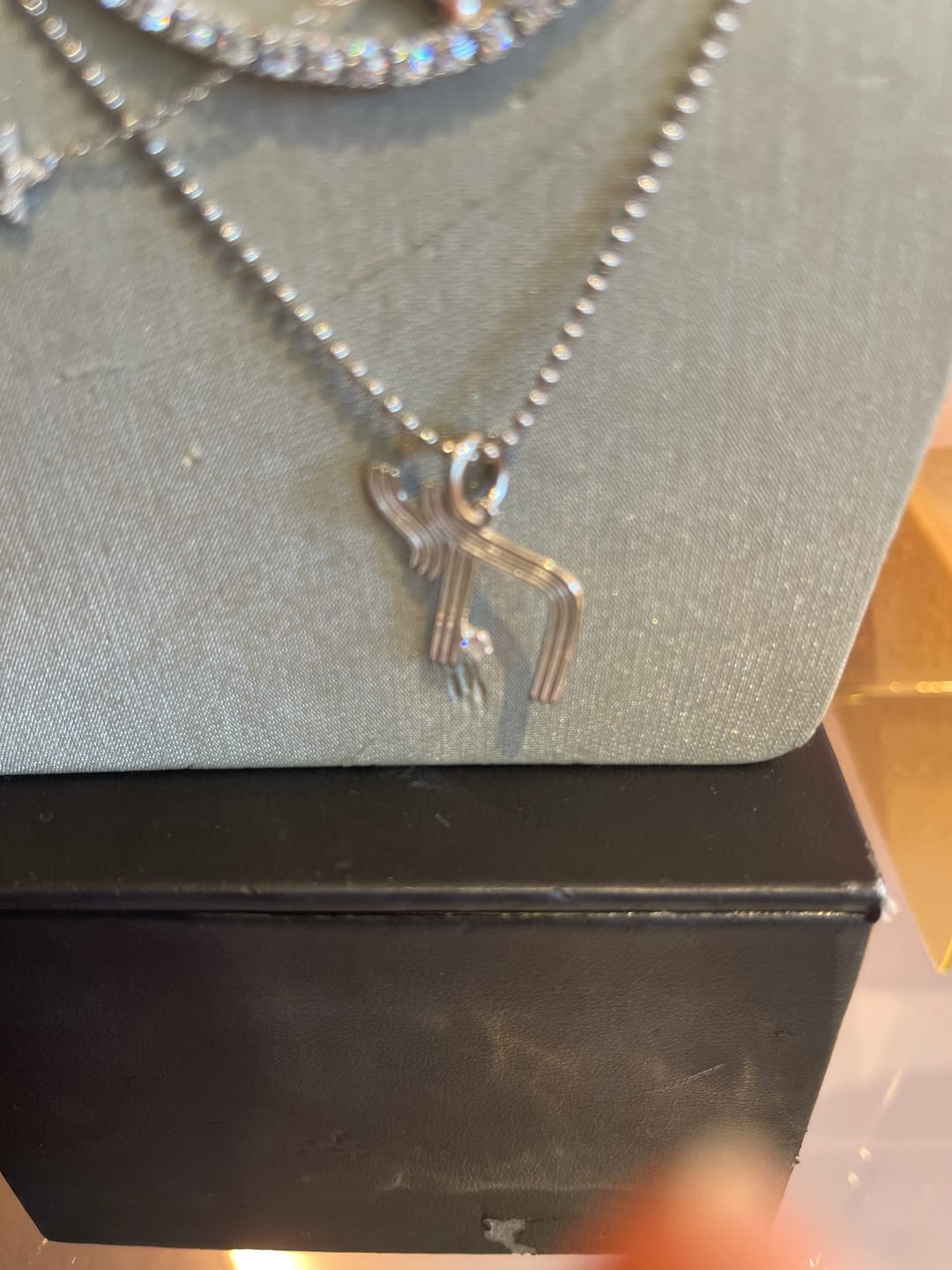 Customer photo review of Chai Flat and Pave Charm