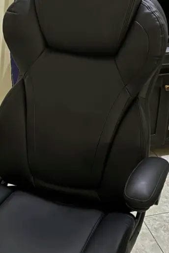 Customer photo review of Ergonomic Leather Executive Office Chair with Flip-Up Armrests