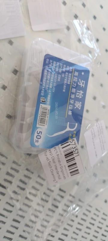 Customer photo review of 50/100PCS Portable Disposable Dental Floss Picks Deep Clean Interdental Sticks Daily Oral Care Travel Teeth Cleaning Tool Set