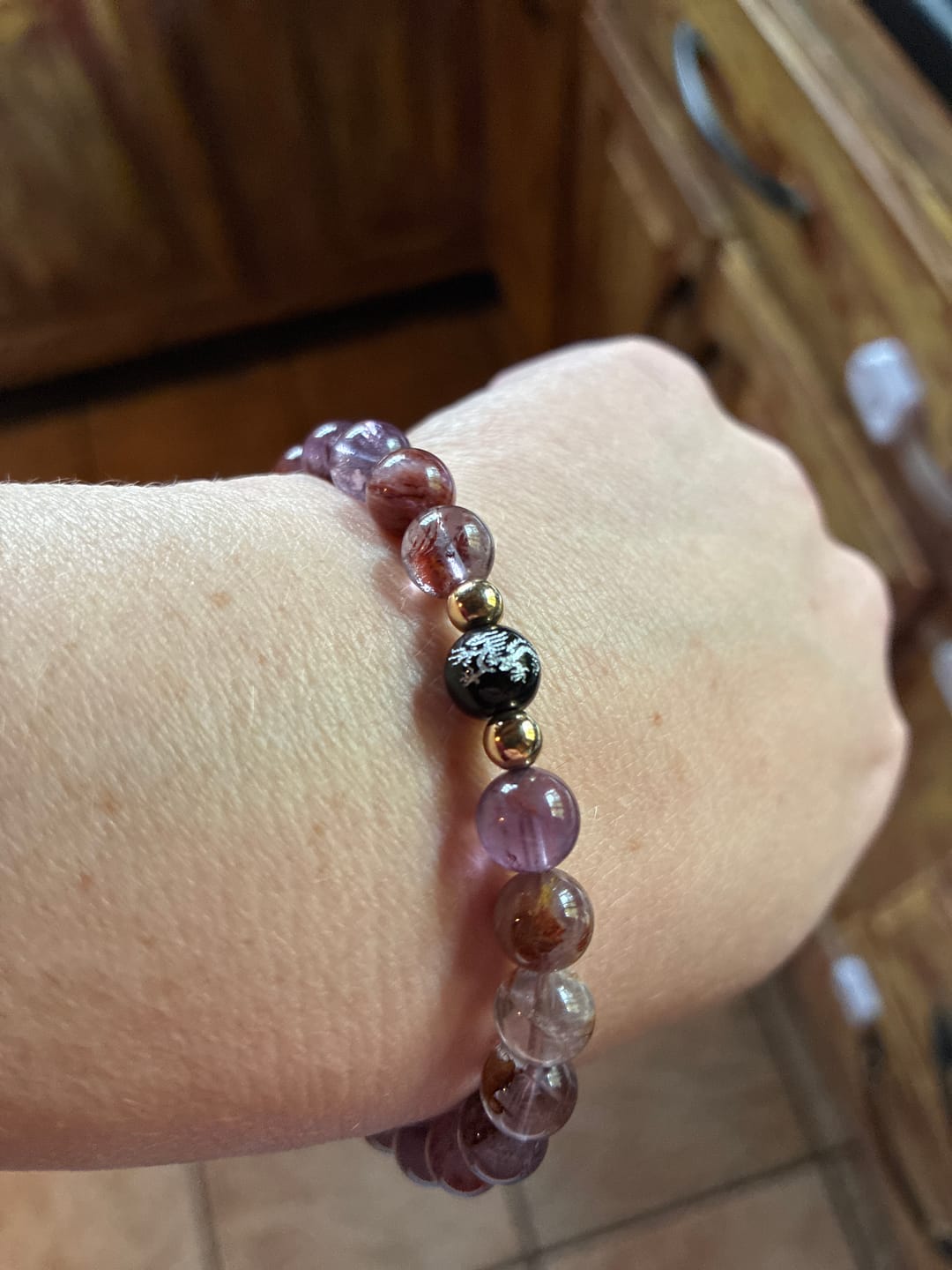 Customer photo review of Super Seven Amethyst Feng Shui Dragon Lucky Bracelet
