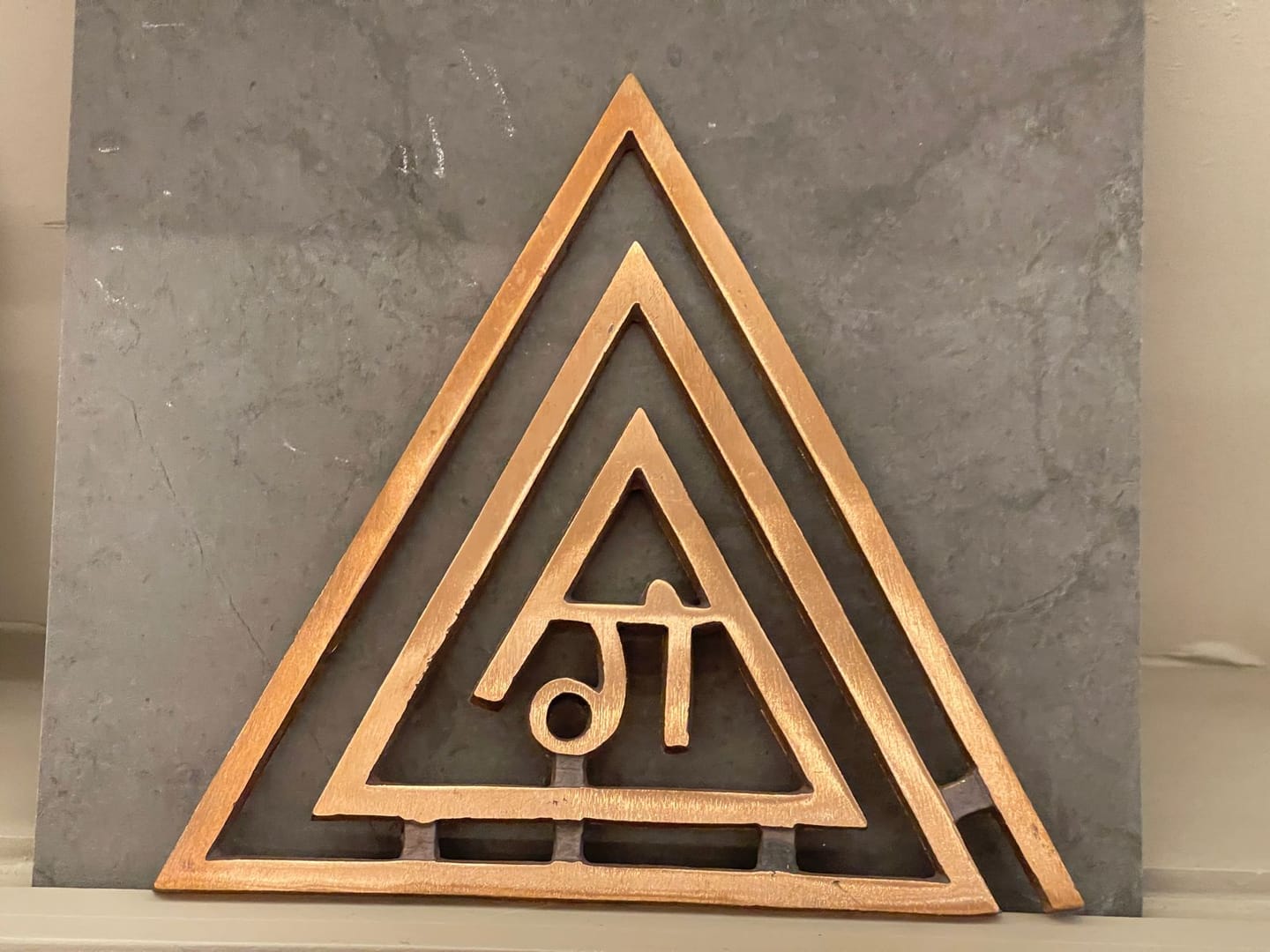 Customer photo review of Copper Triangle Ga (ग) Helix | Vastu Remedy for South-East Fire Zone Balance, Cash Flow & Kitchen Defects | 4–6 Inch