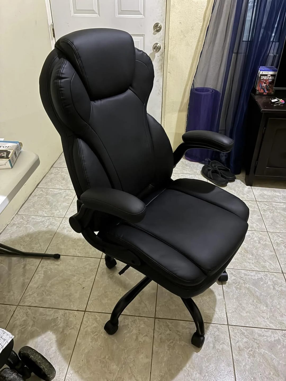Customer photo review of Ergonomic Leather Executive Office Chair with Flip-Up Armrests