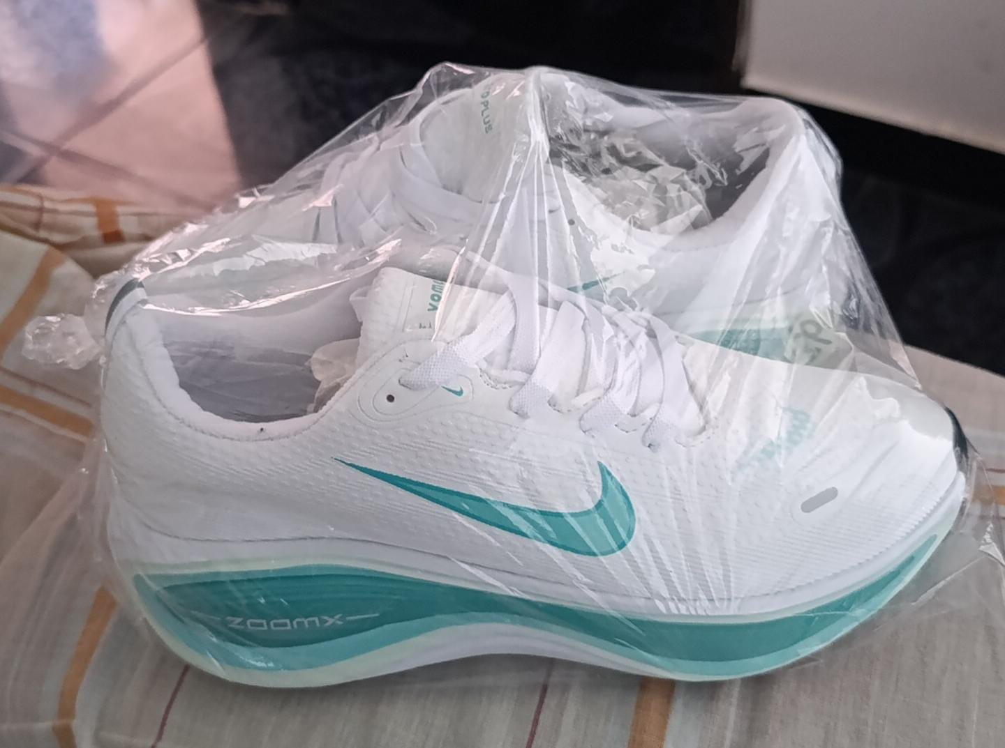 Customer photo review of NIKE VOMERO PLUS - DAMA