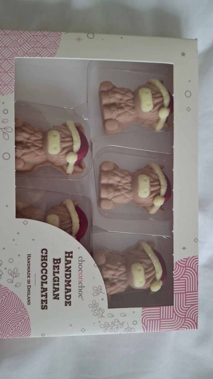 Customer photo review of Chocolate Christmas Highland Cows