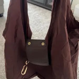 Customer photo review of Borsa Pieghevole Resistente in Nylon con Gancio e Regolabile