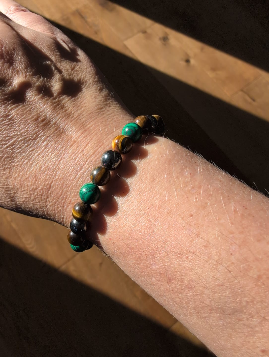 Customer photo review of »Erdung« Blockadenlöser-Armband aus Malachit, Hämatit und Tigerauge inkl. abgebrochenem Stern