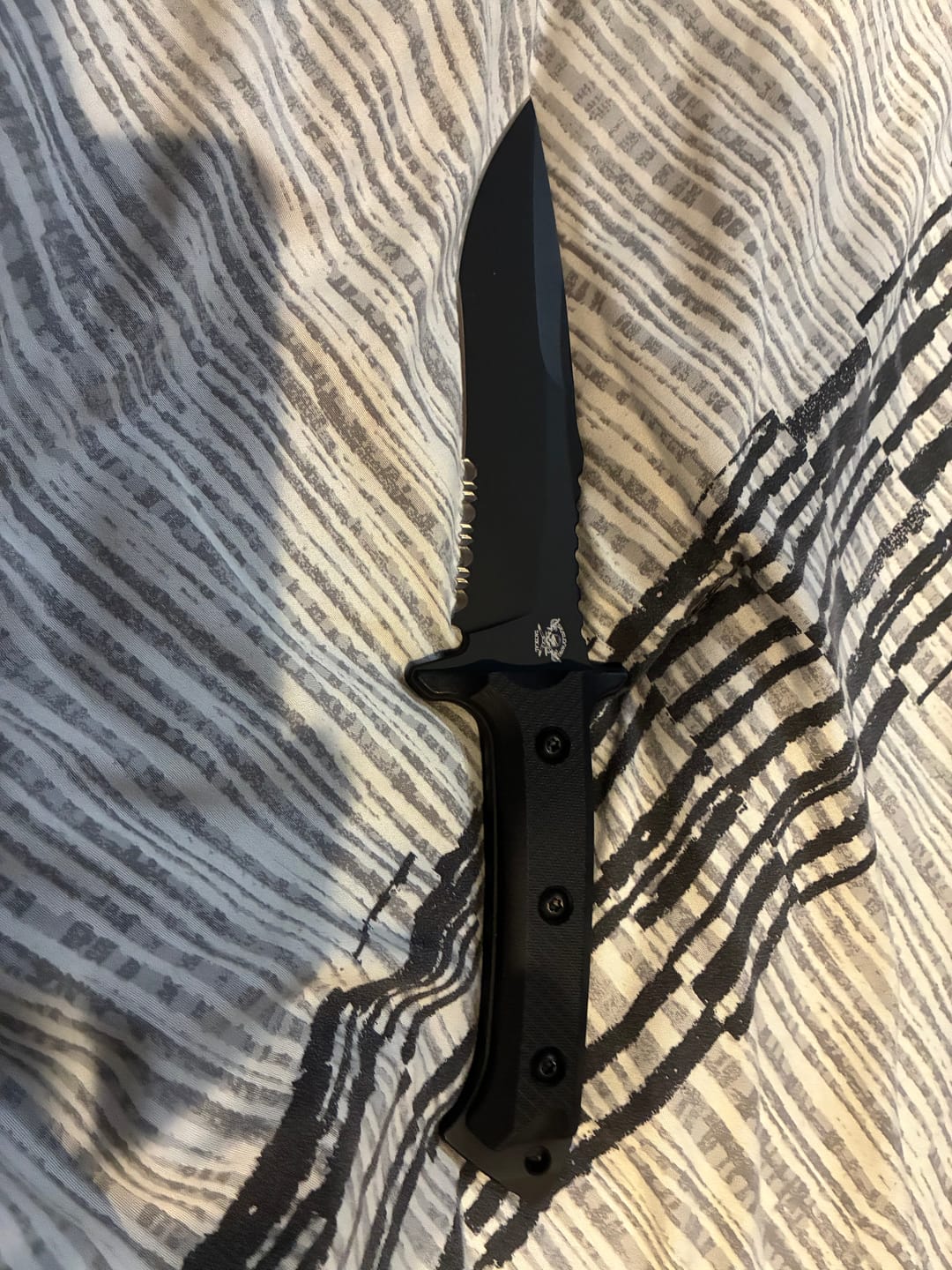 Customer photo review of Riptide Spear Point Serrated
