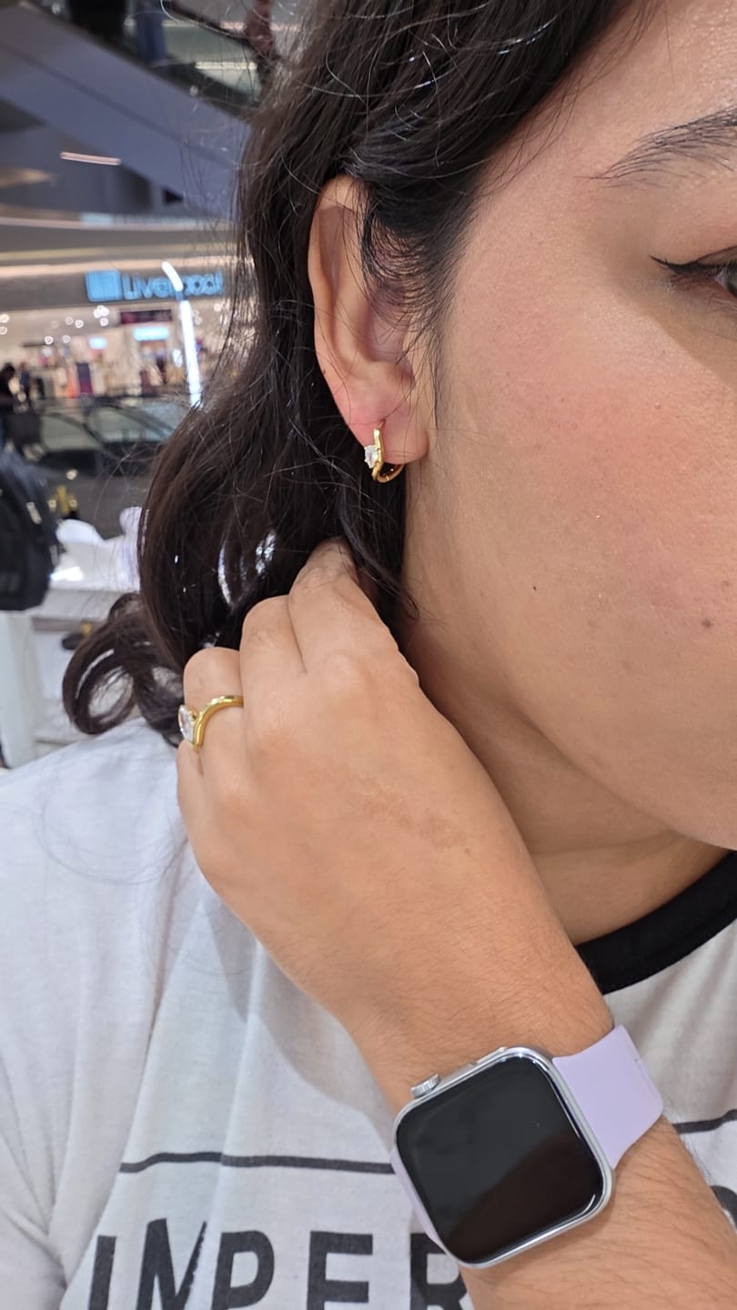 Customer photo review of Par Arracada Ondulada Con Zirconia Forma Pera