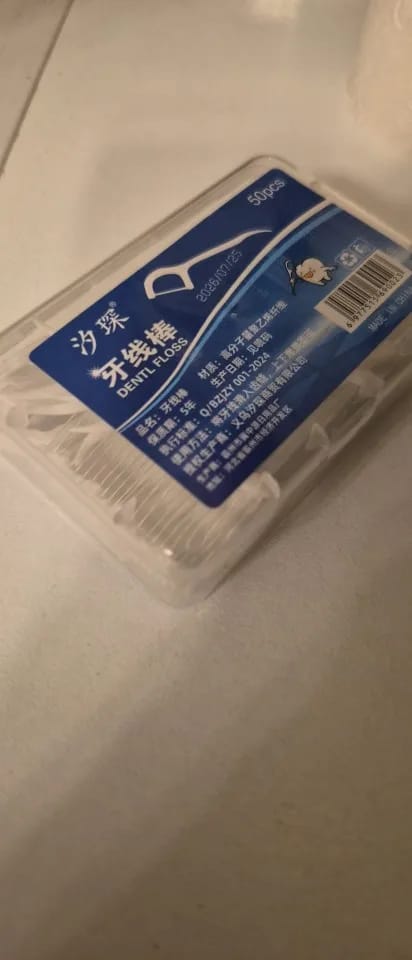 Customer photo review of 50/100PCS Portable Disposable Dental Floss Picks Deep Clean Interdental Sticks Daily Oral Care Travel Teeth Cleaning Tool Set
