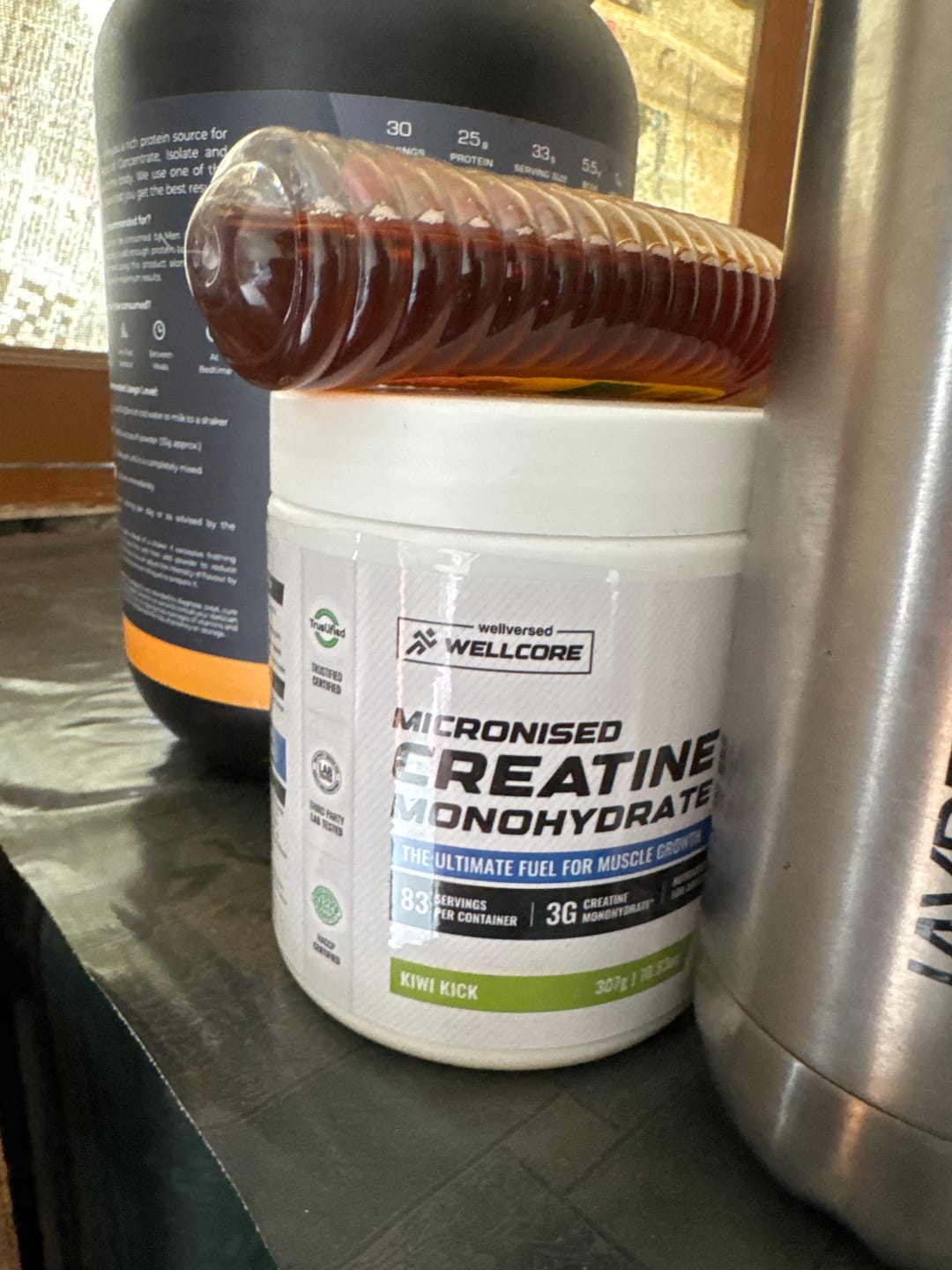 Customer photo review of Wellcore - Micronised Creatine Monohydrate (83 Servings, Kiwi Kick) + Premium Glass Bottle