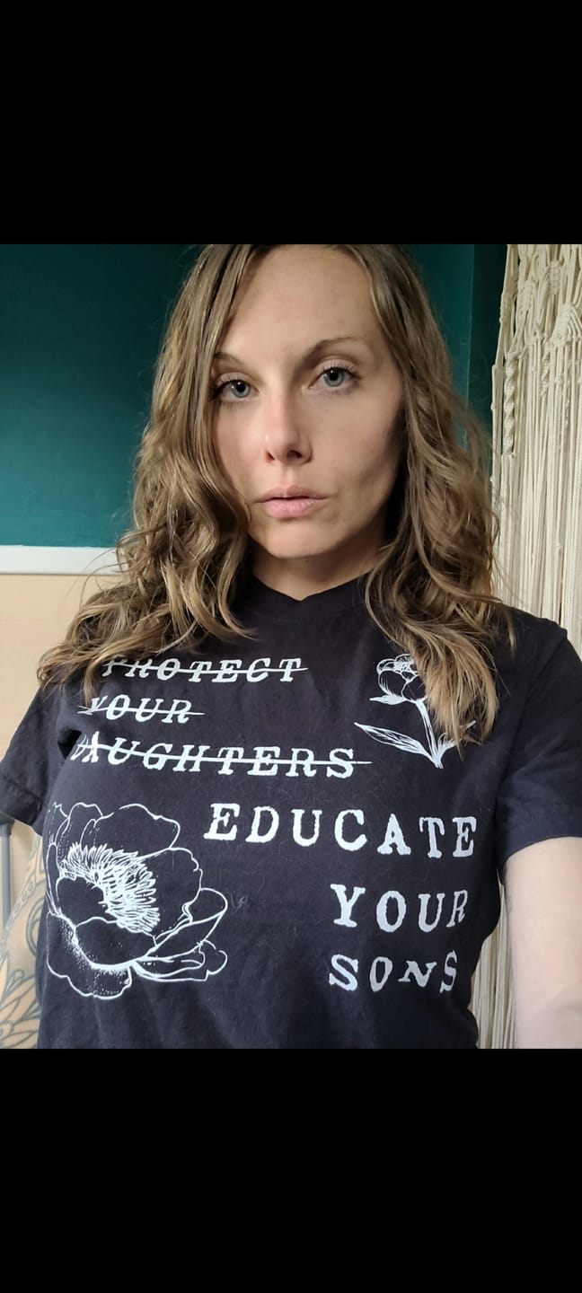 Customer photo review of Protect Your Daughters Educate Your Sons Tee