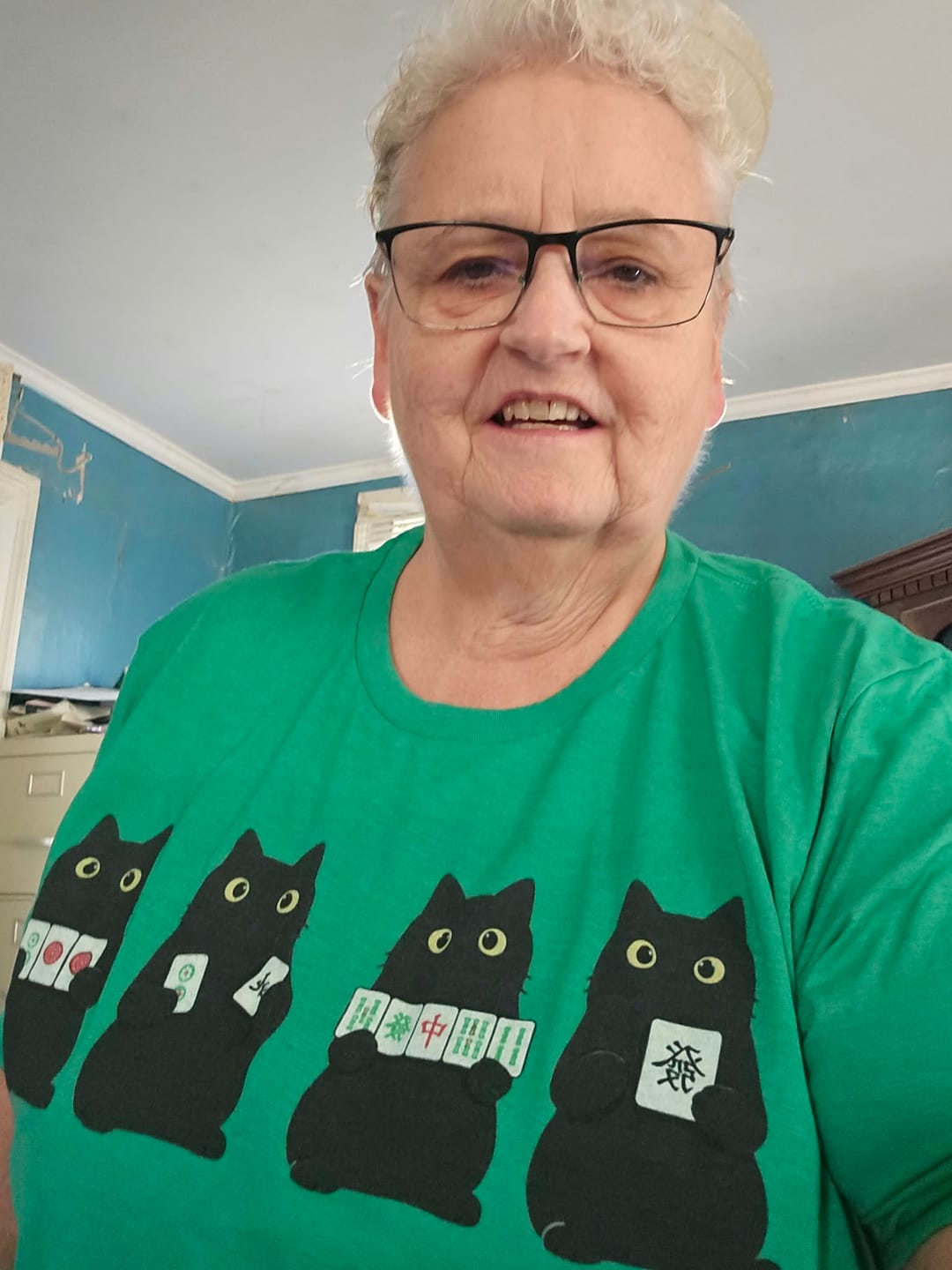 Customer photo review of Cats playing Mahjong T-shirt