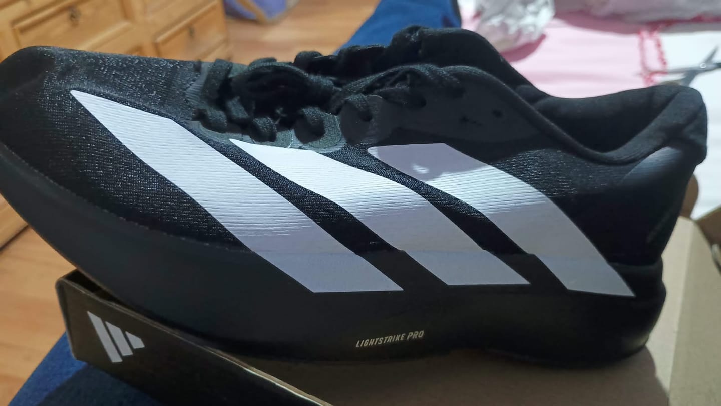Customer photo review of Adidas Adizero EVO SL Blanco Negro Unisex México | Tenis running