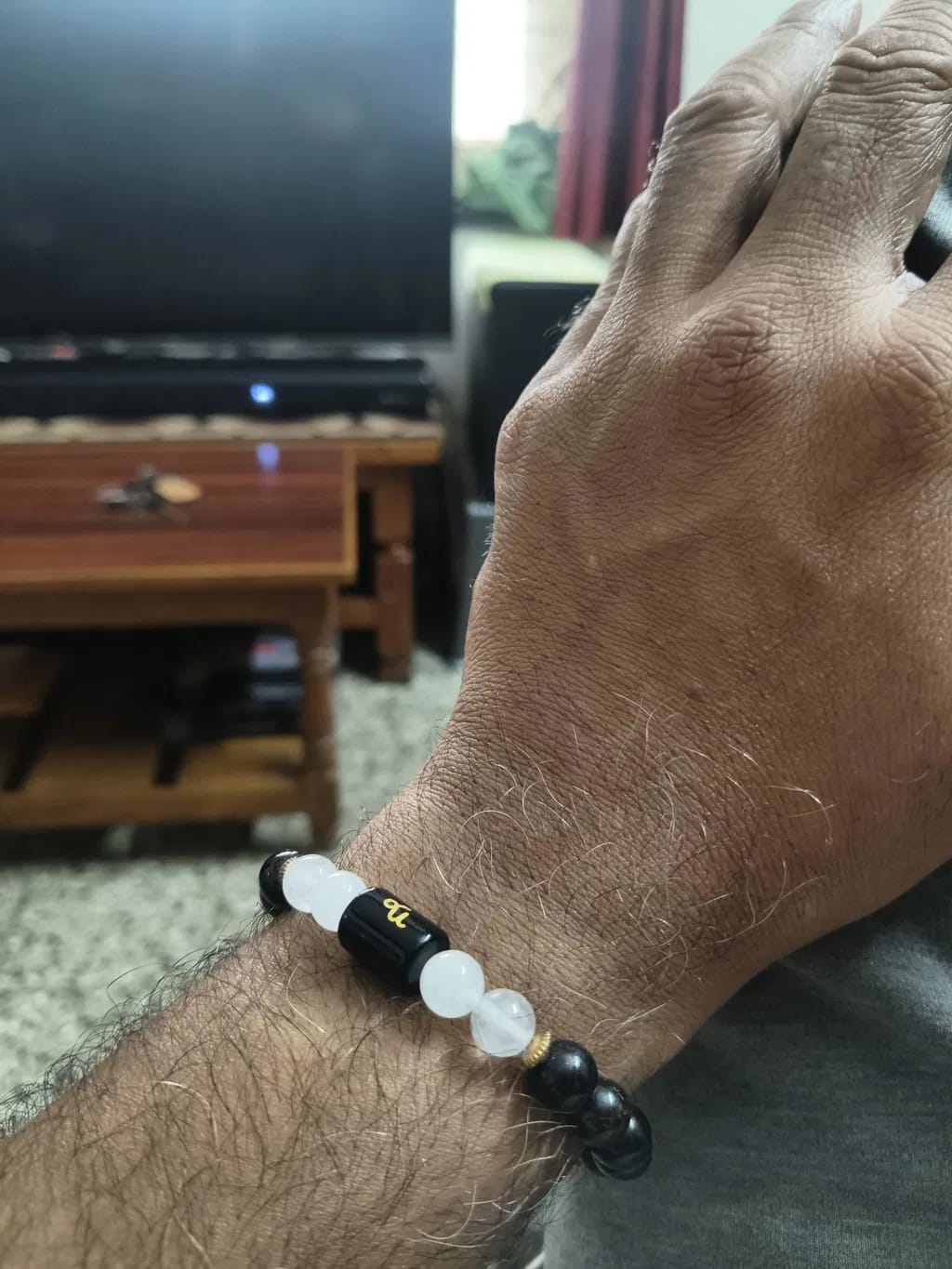 Customer photo review of Capricorn (Makar Rashi) Zodiac Bracelet – Natural Garnet & Milky Quartz