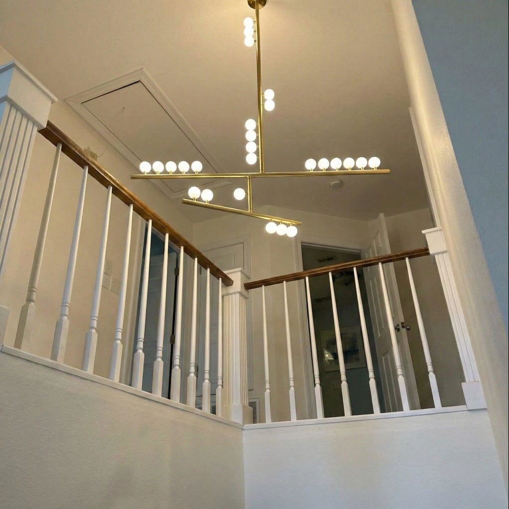Customer photo review of White Orb Glass Pendant Light, Hand-Blown, Tilting Joints, Brass